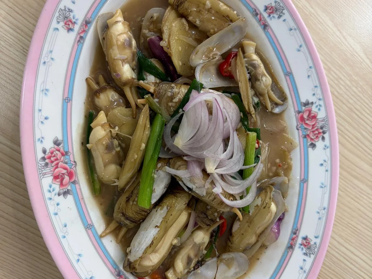 Razor Clams cooked with ginger and scallion